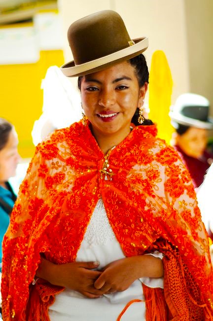Cholita's women proudly wearing their traditional dress in public offices. 
