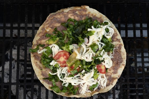 what to eat in Mexico Tlayuda de cecina y chorizo